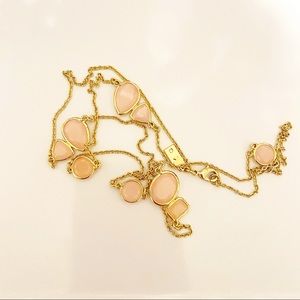 Set of two Kate Spade layering necklaces.